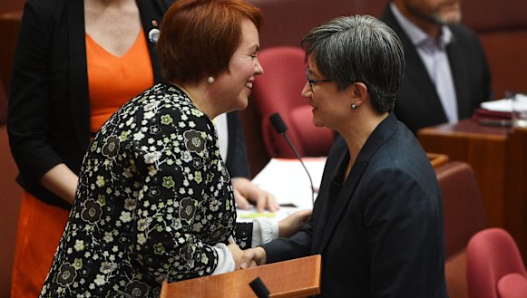 Kitching celebrates her maiden Senate speech with Penny Wong. 
