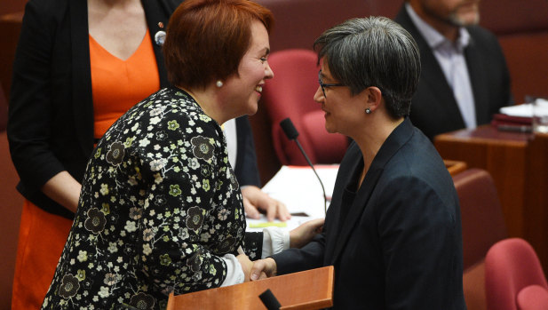 Kitching celebrates her maiden Senate speech with Penny Wong. 