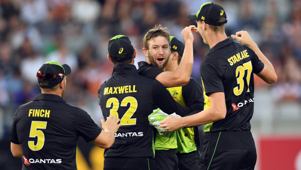 Andrew Tye celebrates after dismissing New Zealand's Mitchell Santner for a duck in the T20 final last night.