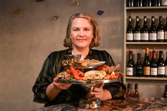 Etta owner Hannah Green with the restaurant’s seafood tower, which makes the most of the prime winter seafood. 