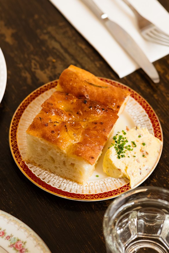 Focaccia with onion butter that uses onion in three different forms.
