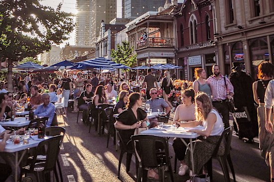 Crowds throng Adelaide’s streets during the Fringe Festival.