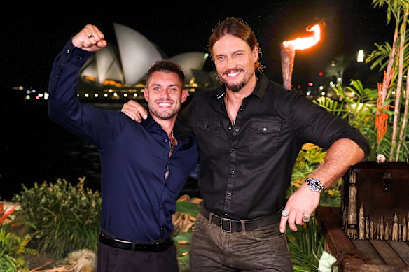 Australian Survivor winner Caleb Beeby with host David Genat at the live final in Sydney. 