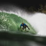 Night riders: Why Kelly Slater’s divisive desert wave pool has put elite surfers in spotlight