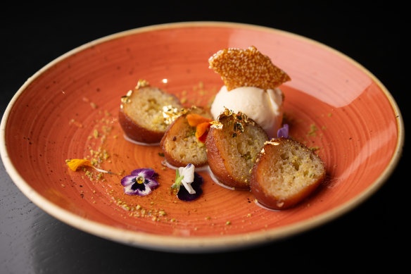 Gulab jamun, poached milk dumplings, are light and floral.  