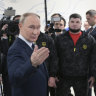 Russian President Vladimir Putin meets with servicemen wounded in Russia’s war on Ukraine during a visit to the Priorov National Medical Research Centre of Traumatology in Moscow.