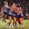 The NSW Blues celebrate Jess Sergis’ try in game one on the full-time siren.