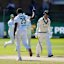 South Africa’s Kagiso Rabada, centre, celebrates the wicket of Australia’s Nic Maddinson, right, on day four.