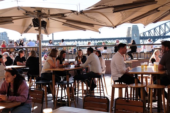Stopping for a drink: Eleven million people visit the Opera House every year.       