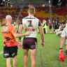 Tom Trbojevic limps from the field after suffering a hamstring injury.