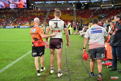 Tom Trbojevic limps from the field after suffering a hamstring injury.