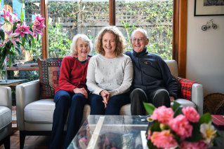 Proud of her: Sarah Rejman (centre) with her parents Sally and Adrian Wallis at the family's Malvern East home. 