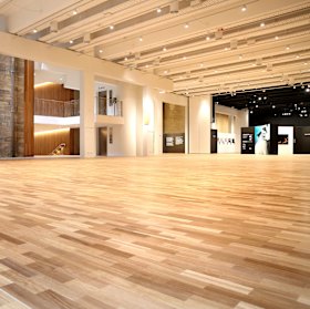 Wooden flooring was used to meld in with the sandstone walls.