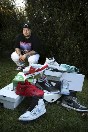 Sneaker enthusiast Jerome Salele'a at home in Belmore with some of his shoe collection.