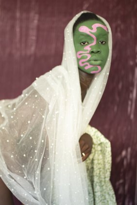 Atong Atem’s Green face with veil.
