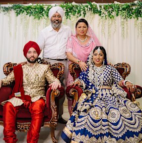 Uppma Virdi with her husband and parents on her wedding day.