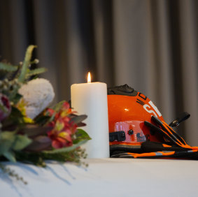 Ms Dray’s hard hat and gloves were laid on her coffin in a mark of respect.