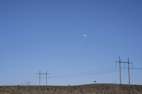 A rocket trail is seen in the sky at the frontline near Bakhmut, Donetsk region, Ukraine.
