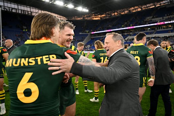 Kevin Walters celebrates the Ashes victory with Cameron Munster and Angus Crichton last year.