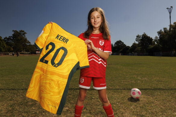 Zara Borcak at Old Bridge FC with the jersey given to her by Sam Kerr at the Australia vs France match in Brisbane on Saturday.