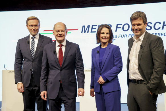 Olaf Scholz (second left) with Christian Lindner, leader of the Free Democratic Party (left), Annalena Baerbock (second right) and Robert Habeck, co-leaders of the Green Party. 