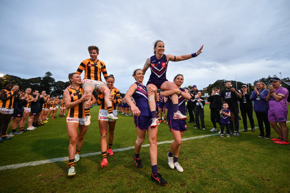 Kara Antonio and Jess Duffin are chaired off in their final games.