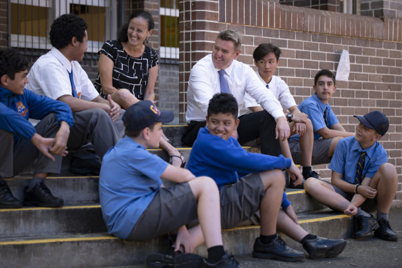Canterbury Boys’ High deputy principal Marilena Webster and principal Ross Dummett with students. A new behavioural policy developed in consultation with students is reaping rewards at the school. 