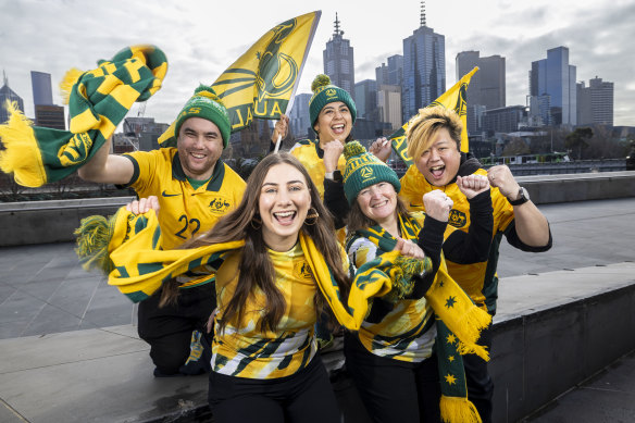 Matildas fans in Melbourne ahead of the FIFA World Cup beginning on Thursday: Georgia Rajic and Cheryl Downes (front). Kieran Yap, Tania Moreno and Dirga Ong. 