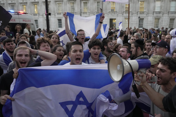 Protesters shout during the “Jewish Community Vigil” for Israel in London.
