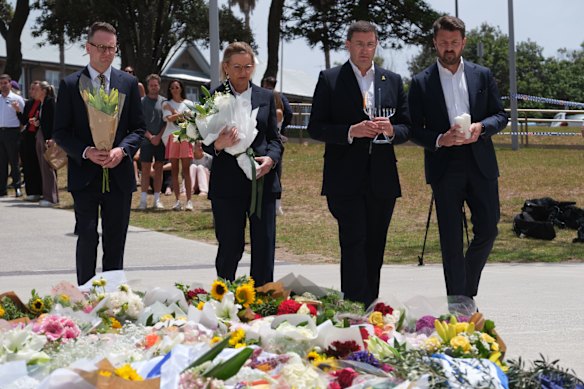 Andrew Bragg (left), with Opposition Leader Sussan Ley and fellow Liberal MPs Julian Leeser and Jonno Duniam at Bondi on Monday.