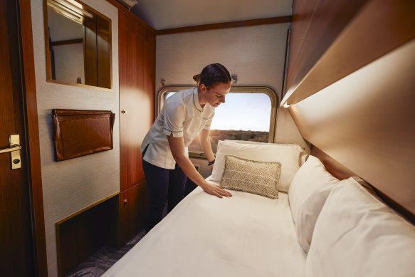 Setting up for a good night’s sleep in a Gold Premium twin cabin.