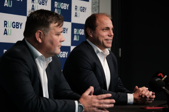 Rugby Australia boss Phil Waugh talking with media, next to new director of high performance Peter Horne.