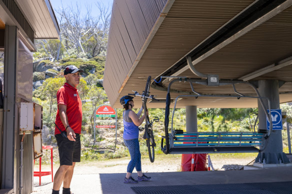 Going up: Former flight attendant Tim Hunt has retrained as a lift operator in Thredbo. 