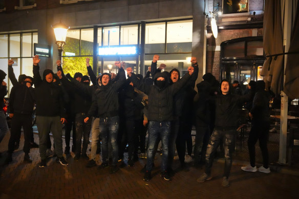 A group of right-wing demonstrators shout at people protesting against the victory of Geert Wilders and his PVV party in Utrecht, Netherlands, on Friday.