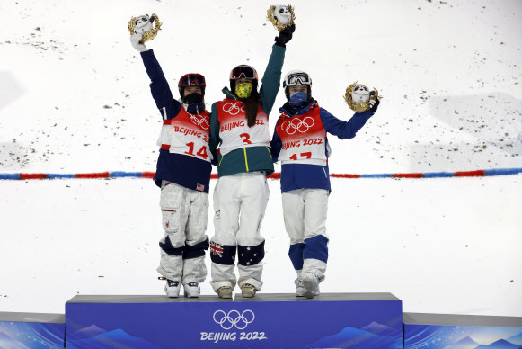 Jakara Anthony celebrates on the podium after her gold medal win, with Jaelin Kauf of the US (silver) and  Russia’s Anastasiia Smirnova (bronze).