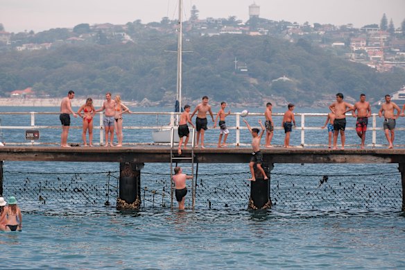People on the jetty at Clifton Gardens, in Sydney’s north.