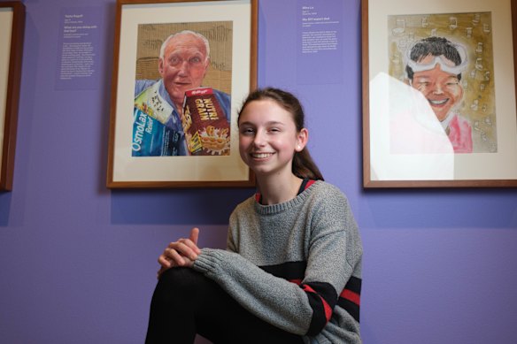 Tasha Rogoff, with her winning portrait,  “What Are You Doing With That Box?”