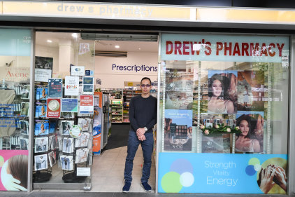 Pharmacist Michel Nguyen outside Drews Pharmacy in Miller Street, North Sydney.