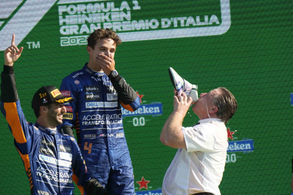 McLaren boss Zak Brown performs a “shoey” after last year’s one-two finish at Monza.