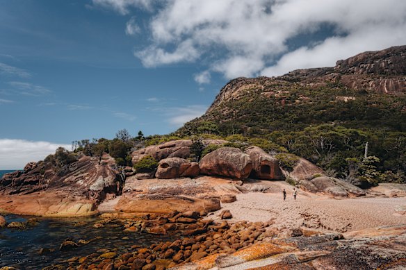 Serene Sleepy Bay, pressed between orange granite outcrops.