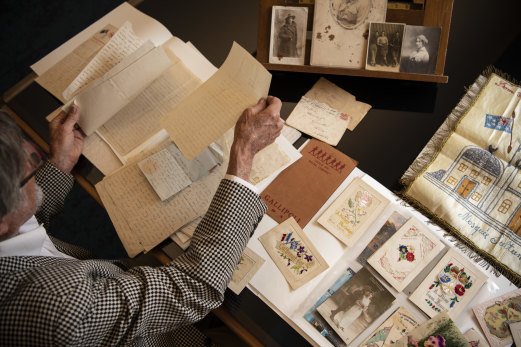 Idris Pike examines personal letters written by his grandfather Idris Charles Pike to his girlfriend Violet Clapson, from 1915-1919 during the Gallipoli campaign. 