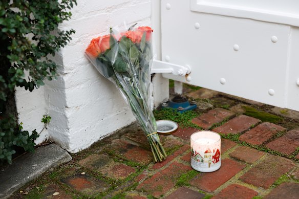 Flowers are placed outside Rob Reiner’s residence in Brentwood.