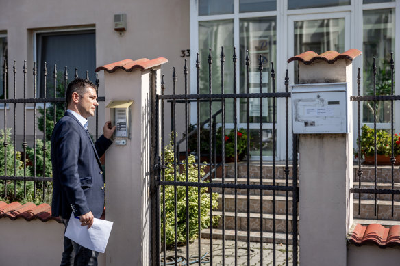 Elod Novak, a member of the National Assembly of Hungary tries to get into the BAC Consulting company in Budapest.