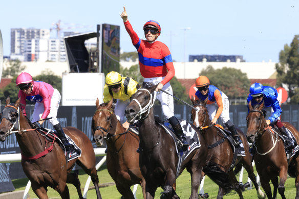 James McDonald points to the sky as Verry Elleegant wins the Ranvet Stakes 