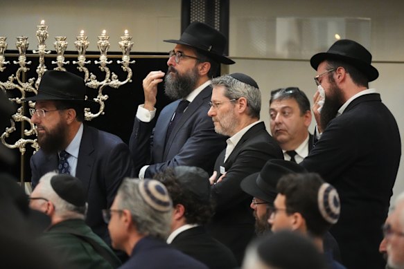 Mourners gather at a synagogue for the funeral of Rabbi Eli Schlanger, a victim in the Bondi Beach mass shooting, on Wednesday, December 17.