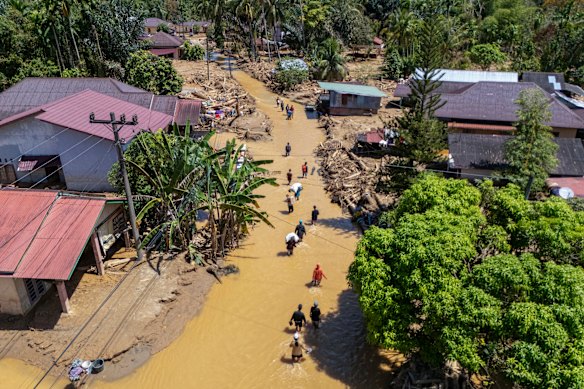 The aftermath of flash floods in Tukka village in North Sumatra.