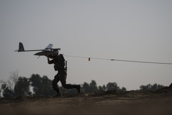 An Israeli soldier prepares to launch a drone near the Israeli-Gaza border, southern Israel in January.