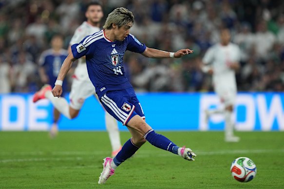 Japan’s Junya Ito strikes on goal for Japan’s third.