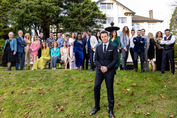 Host Rodger Corser with the cast of The Traitors.