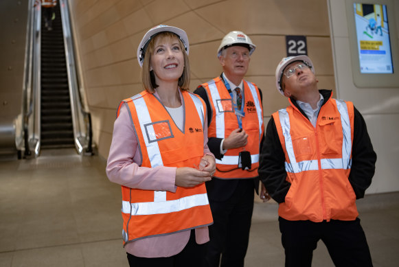 Transport Minister Jo Haylen (left) with Transport for NSW acting secretary Howard Collins and Sydney Metro chief executive Peter Regan on the underground concourse of Central Station.